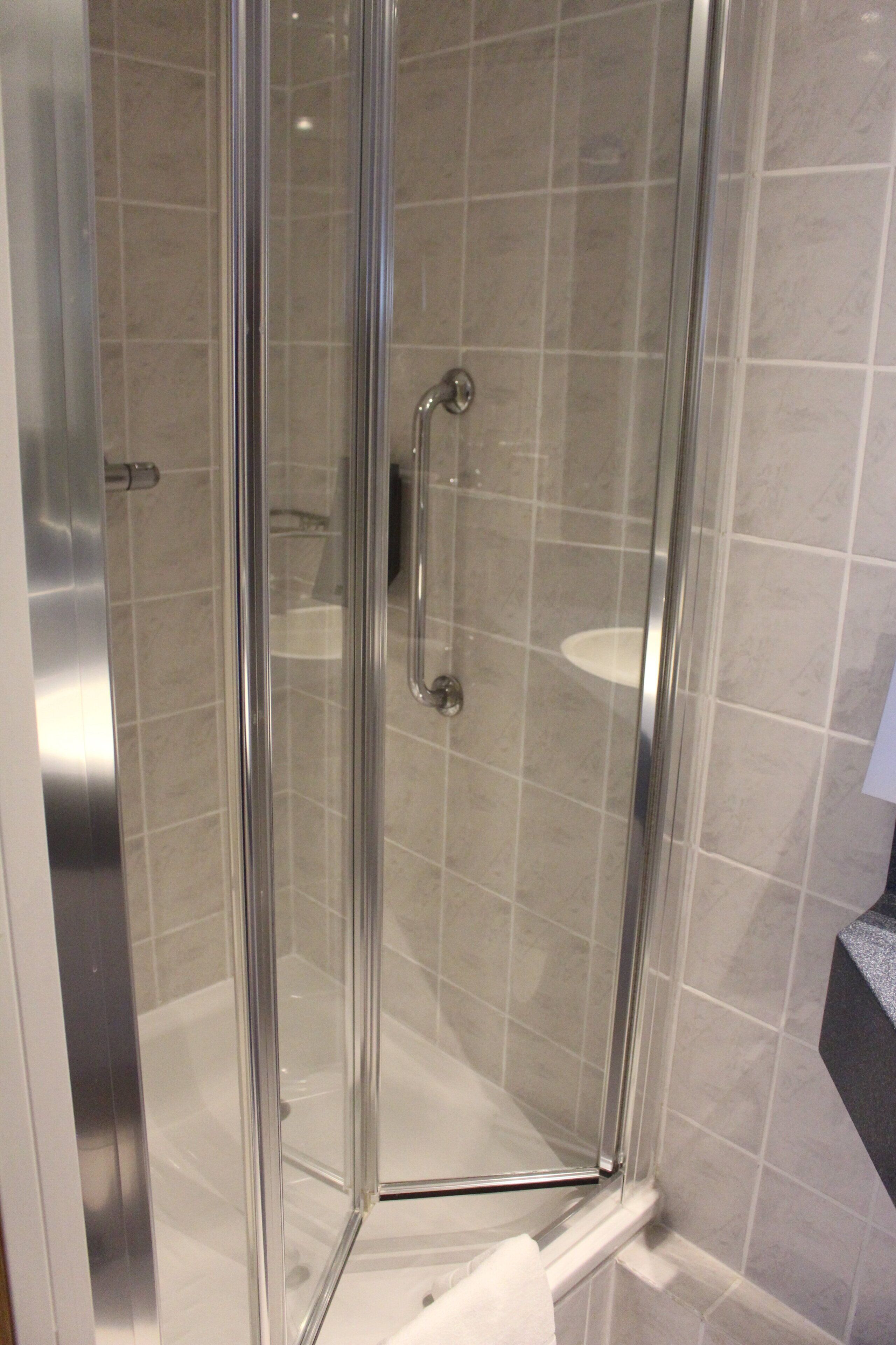 Shower, free toiletries, hair dryer, towels