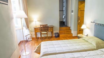 Doppia Superior | Copriletto in piuma, minibar, una cassaforte in camera, una scrivania