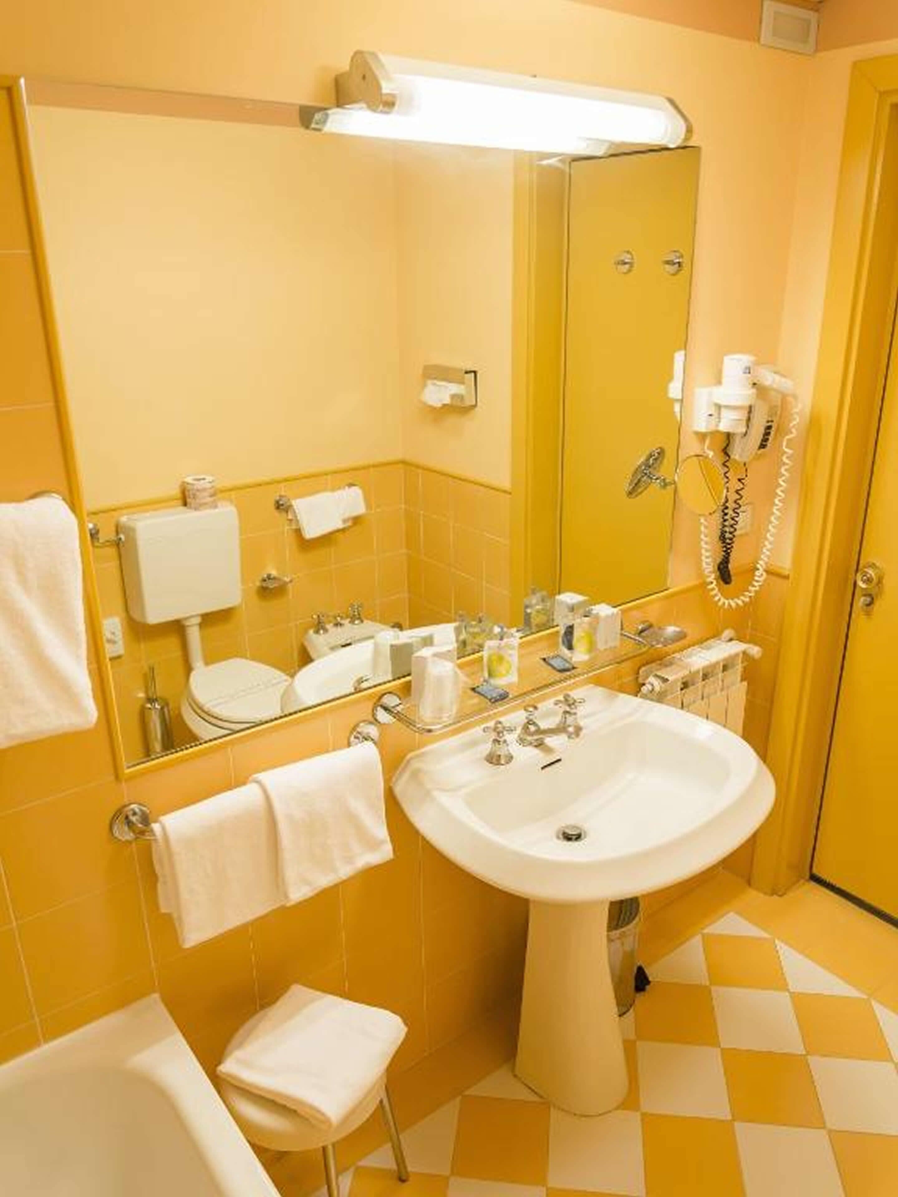 eco-friendly toiletries, hair dryer, bidet, towels