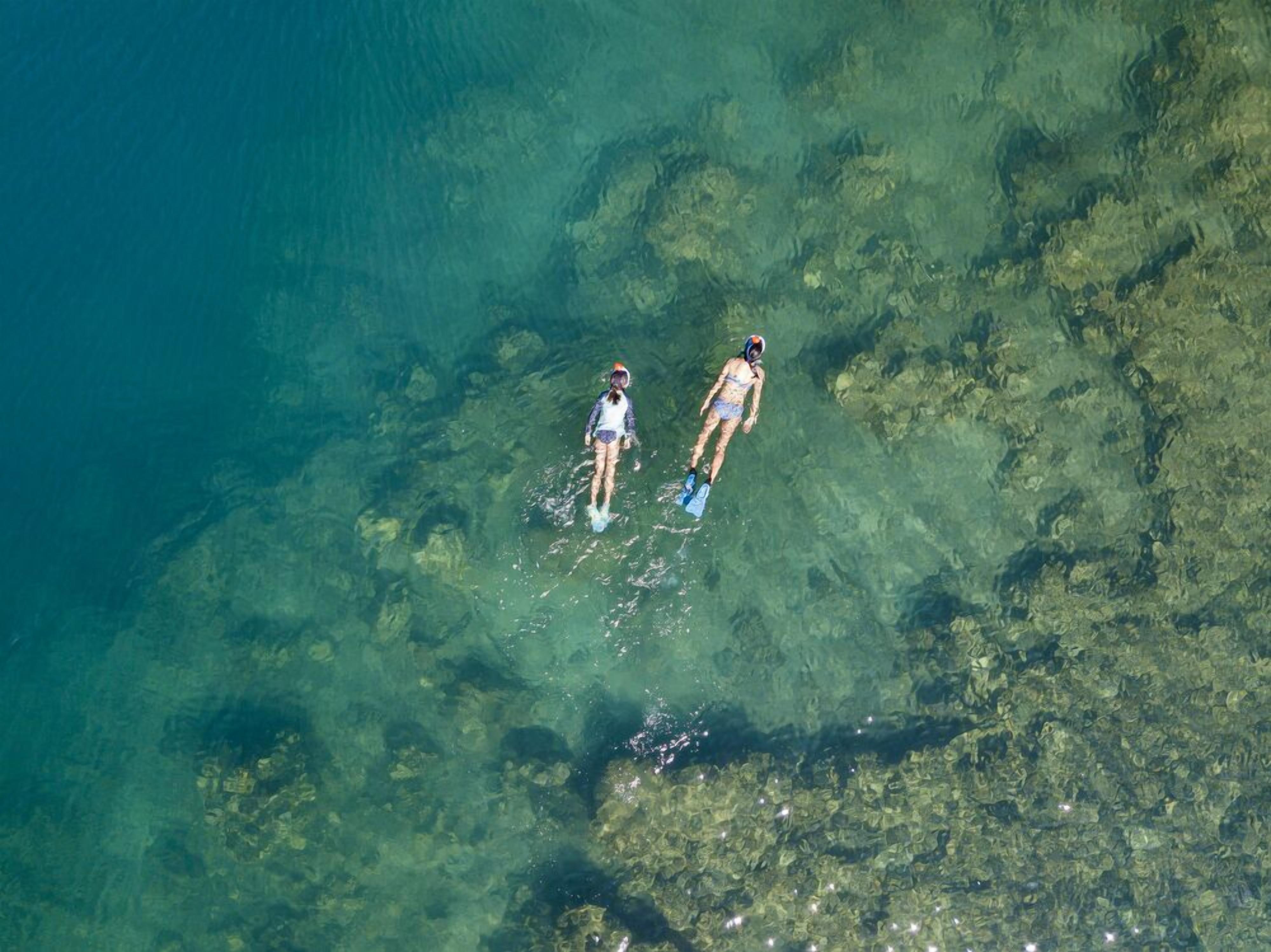 private beach, white sand, free beach cabanas, sun-loungers