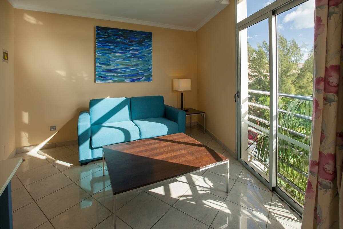 junior suite, balcony | living room | 32-inch tv with satellite channels