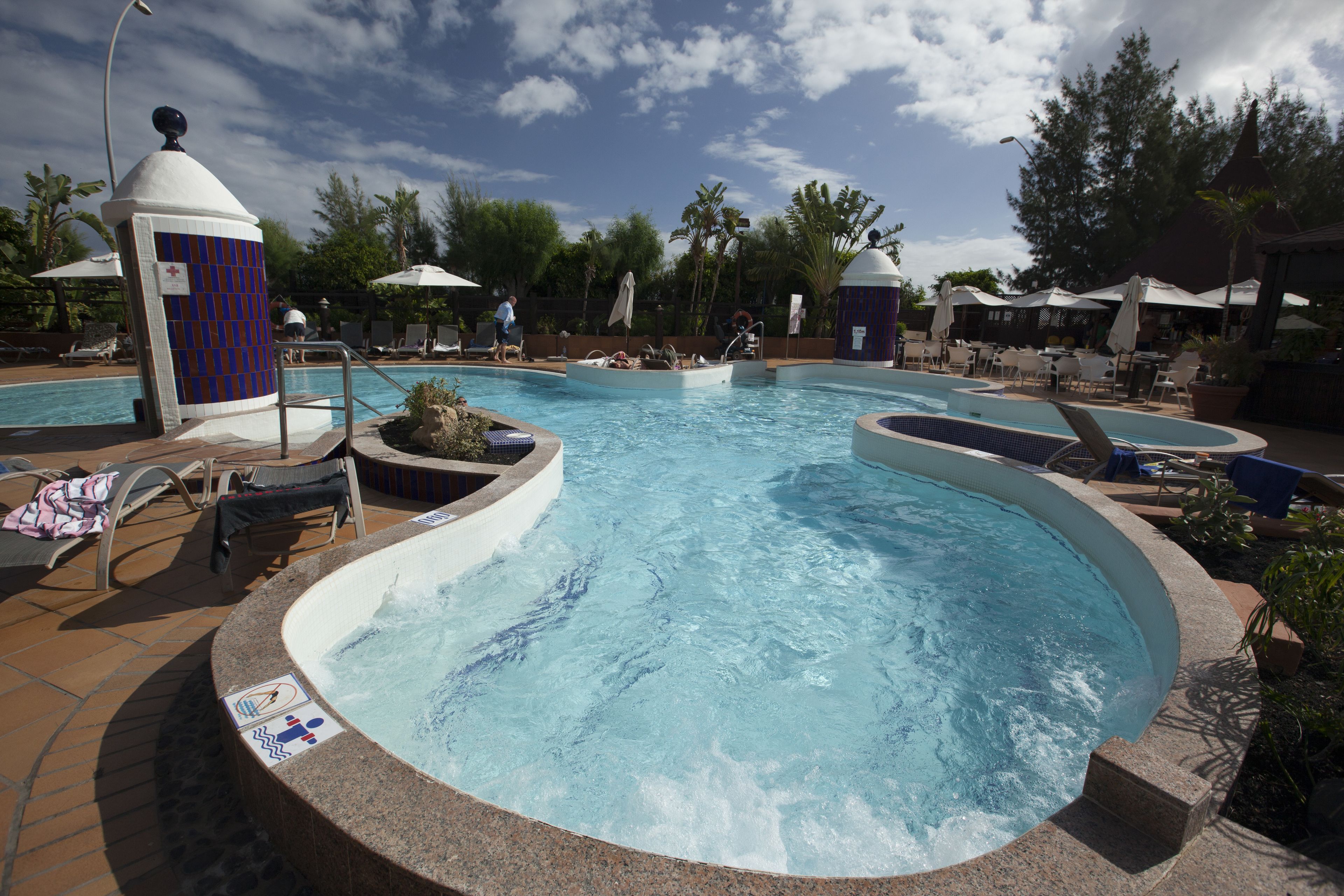 2 outdoor pools, pool umbrellas, pool loungers