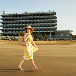 On the beach, white sand, beach towels