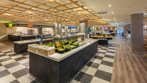 A buffet area with various food stations, including a salad bar and hot food options. - Abora Interclub Atlantic by Lopesan Hotels - All inclusive (San Bartolomé de Tirajana)