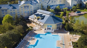 Indoor pool, outdoor pool, open 7 AM to 10 PM, pool loungers