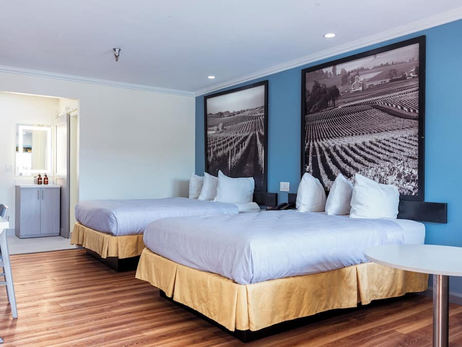 Deluxe Studio | Premium bedding, down duvets, desk, blackout curtains