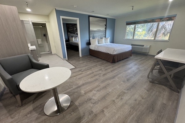 Grand Suite | Premium bedding, down comforters, desk, blackout drapes