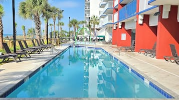 3 indoor pools, 2 outdoor pools, open 8 AM to 11 PM, pool umbrellas