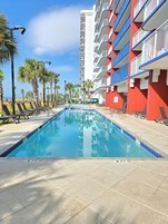 2 indoor pools, 2 outdoor pools, open 9:00 AM to 11 PM, pool umbrellas