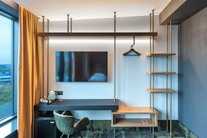 Desk, laptop workspace, blackout drapes, iron/ironing board