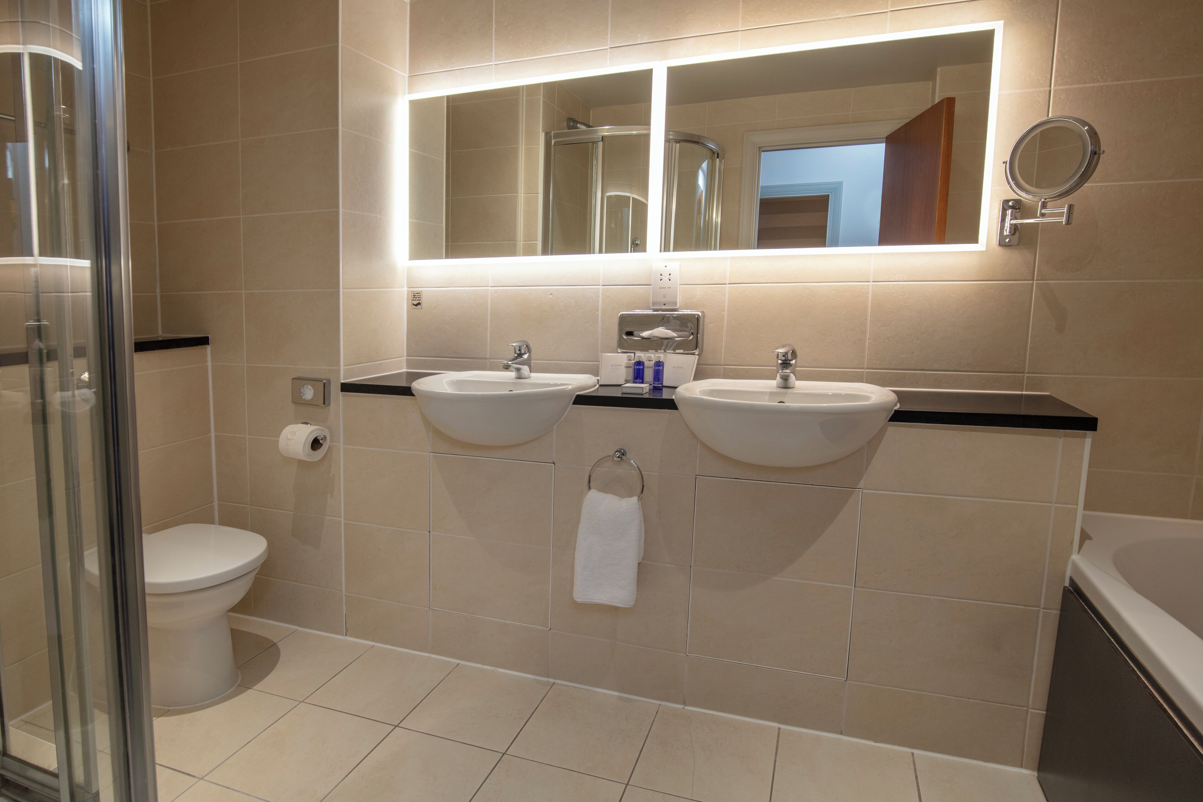 junior suite | bathroom | separate bathtub and shower, free toiletries, hair dryer, towels