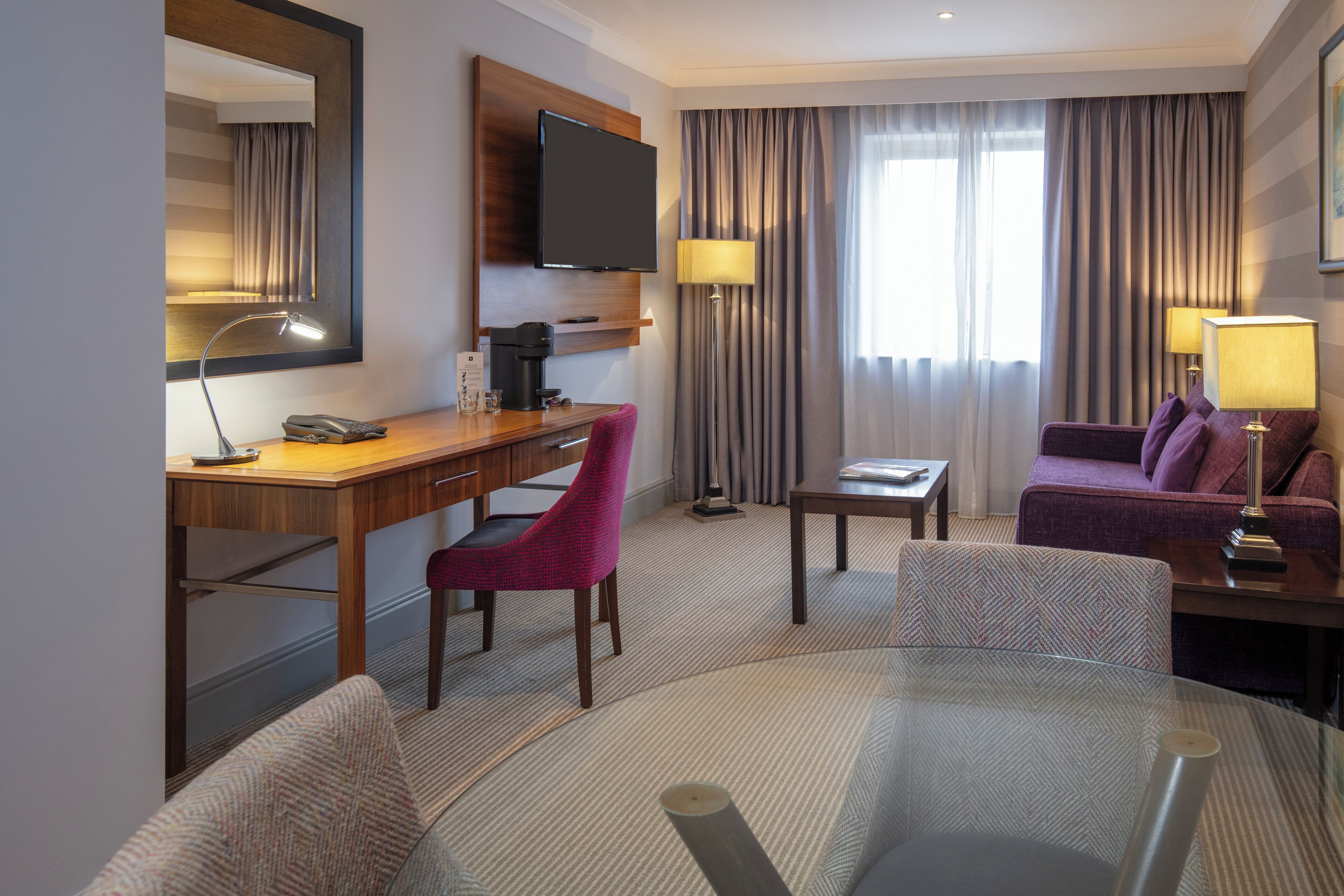 junior suite | 1 bedroom, in-room safe, desk, laptop workspace