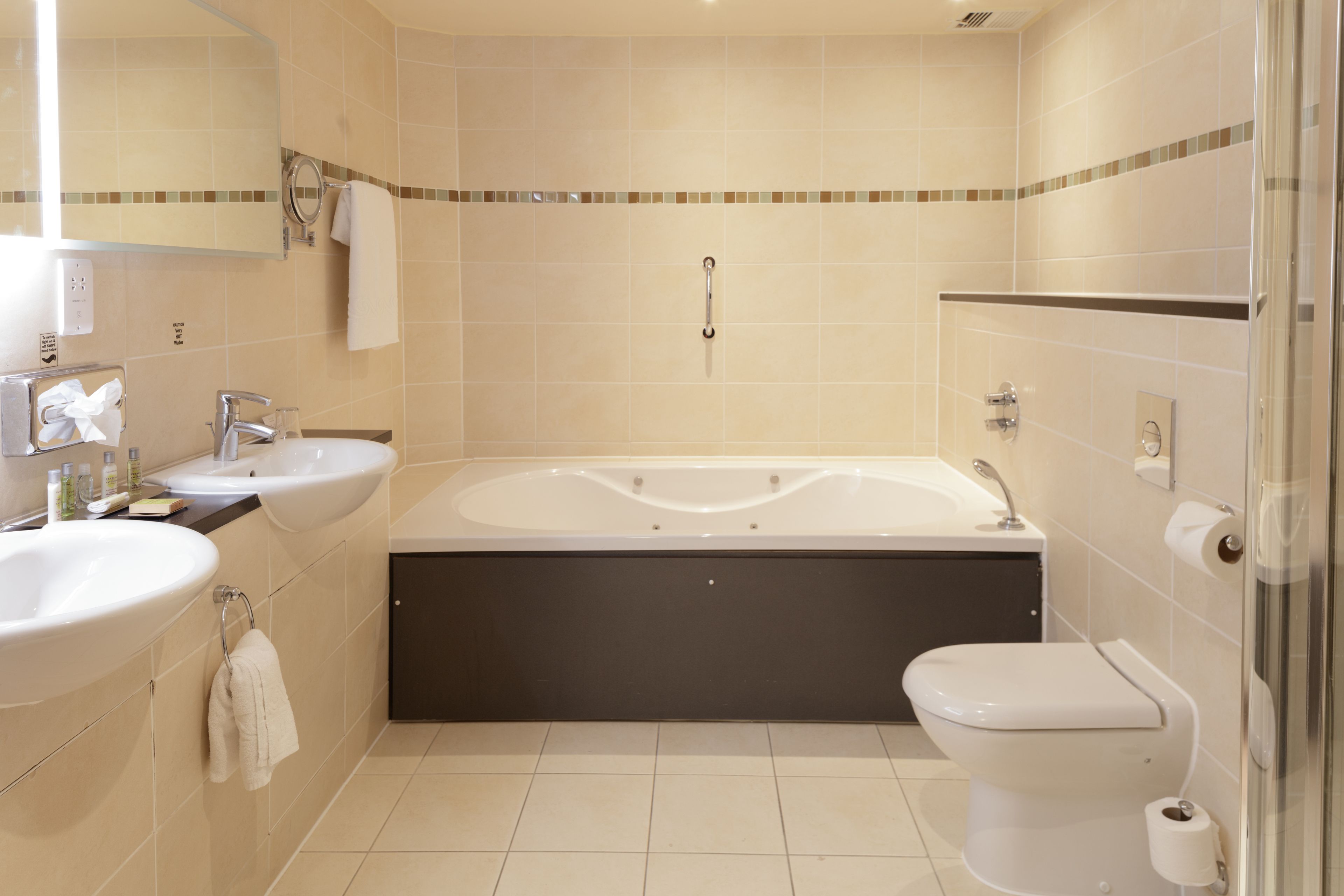 separate bathtub and shower, free toiletries, hair dryer, towels