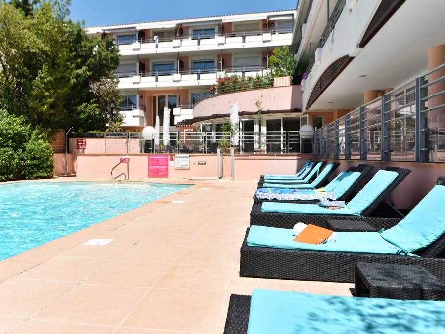 Seasonal outdoor pool, open 9:00 AM to 8:00 PM, sun loungers
