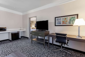 Deluxe Suite, 1 King Bed, Non Smoking | Premium bedding, desk, blackout drapes, iron/ironing board