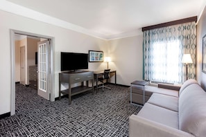 Deluxe Suite, 1 King Bed, Non Smoking | Premium bedding, desk, blackout drapes, iron/ironing board