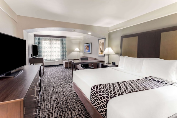 Deluxe Suite, 1 King Bed, Non Smoking | Premium bedding, desk, blackout drapes, iron/ironing board