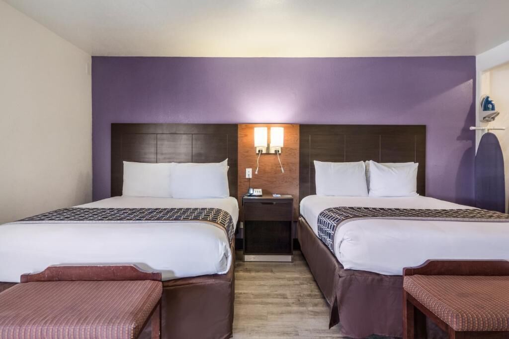 Desk, laptop workspace, blackout curtains, iron/ironing board