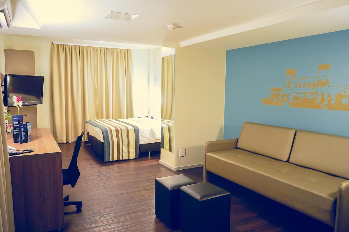 Minibar, in-room safe, blackout drapes, free WiFi