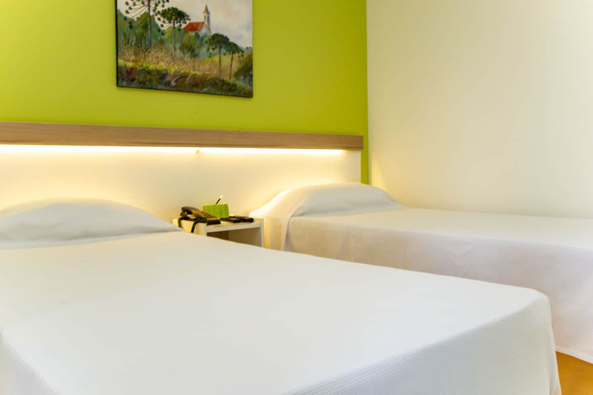 Habitación exclusiva con 2 camas individuales, 2 camas individuales | Minibar, caja de seguridad en la habitación, wifi gratis y ropa de cama