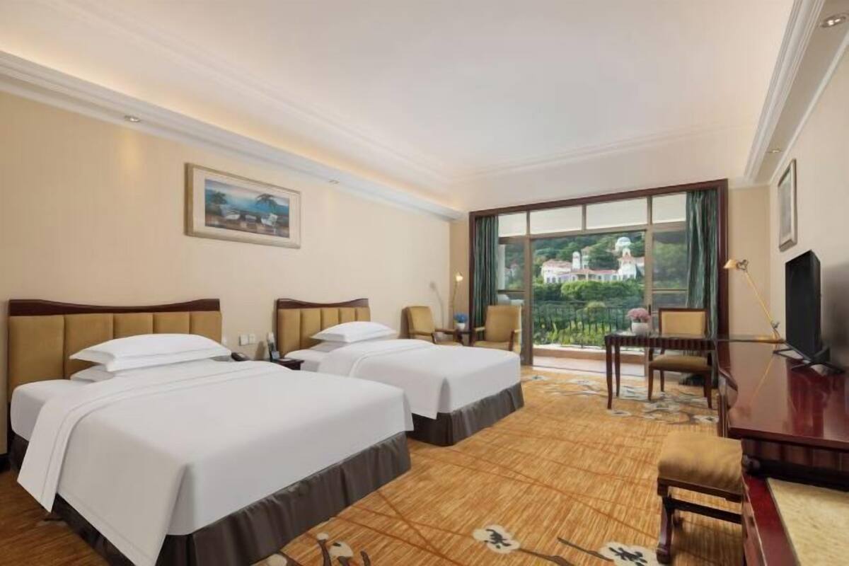 Edredón, camas con pillow-top y artículos del minibar gratis 