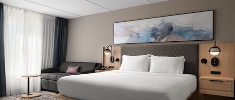 Deluxe Room, 1 King Bed, Jetted Tub | Living area | TV