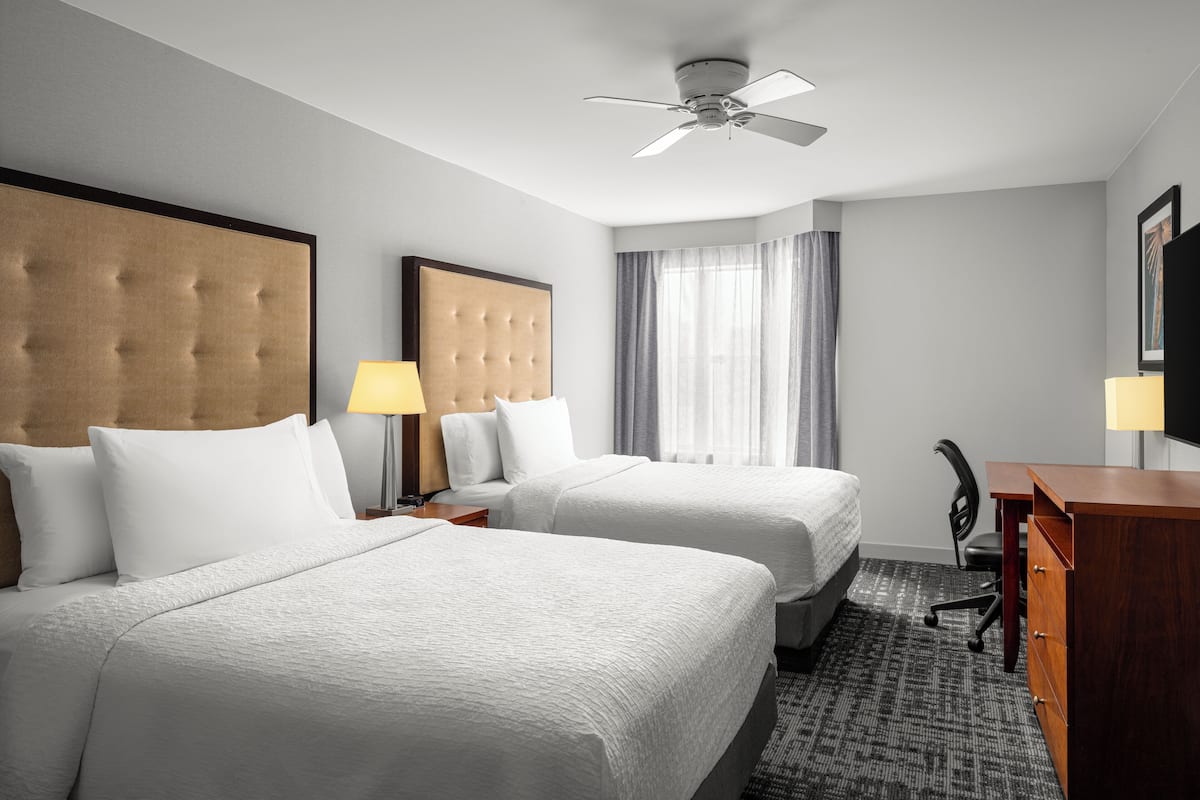 Pillowtop beds, in-room safe, desk, laptop workspace