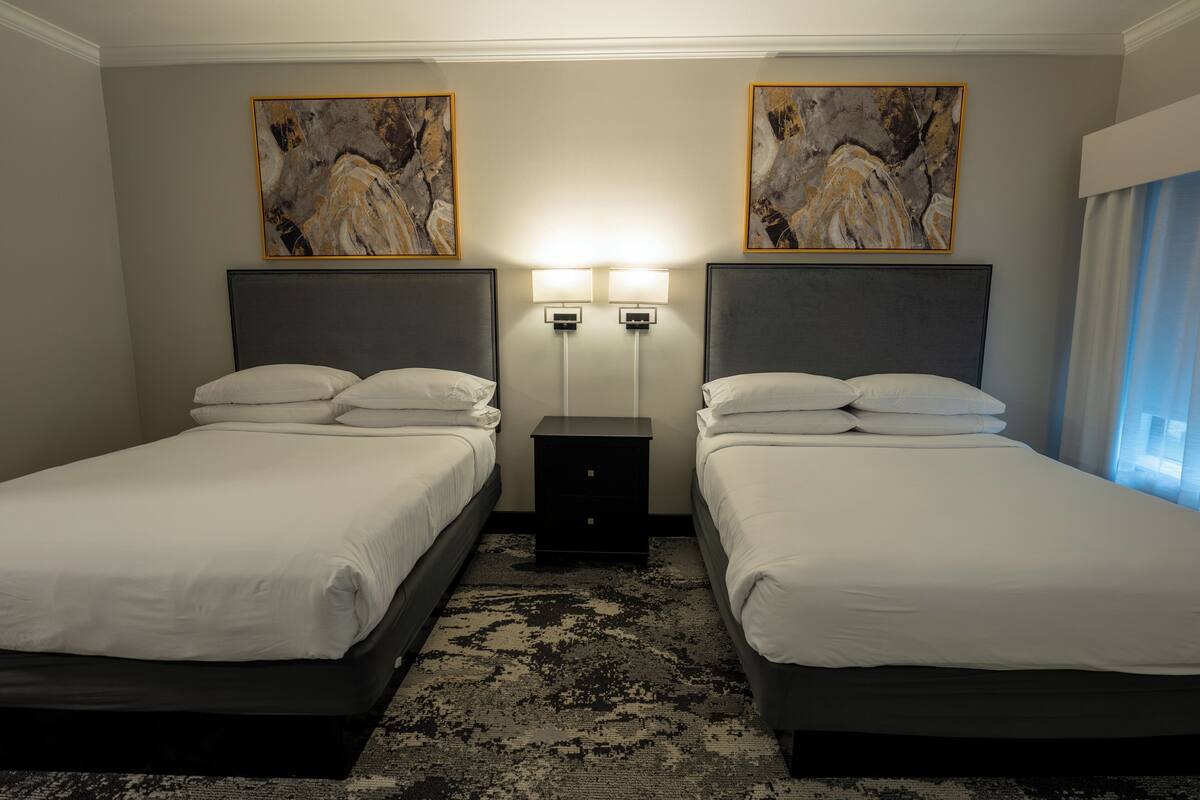Premium bedding, down comforters, pillowtop beds, in-room safe