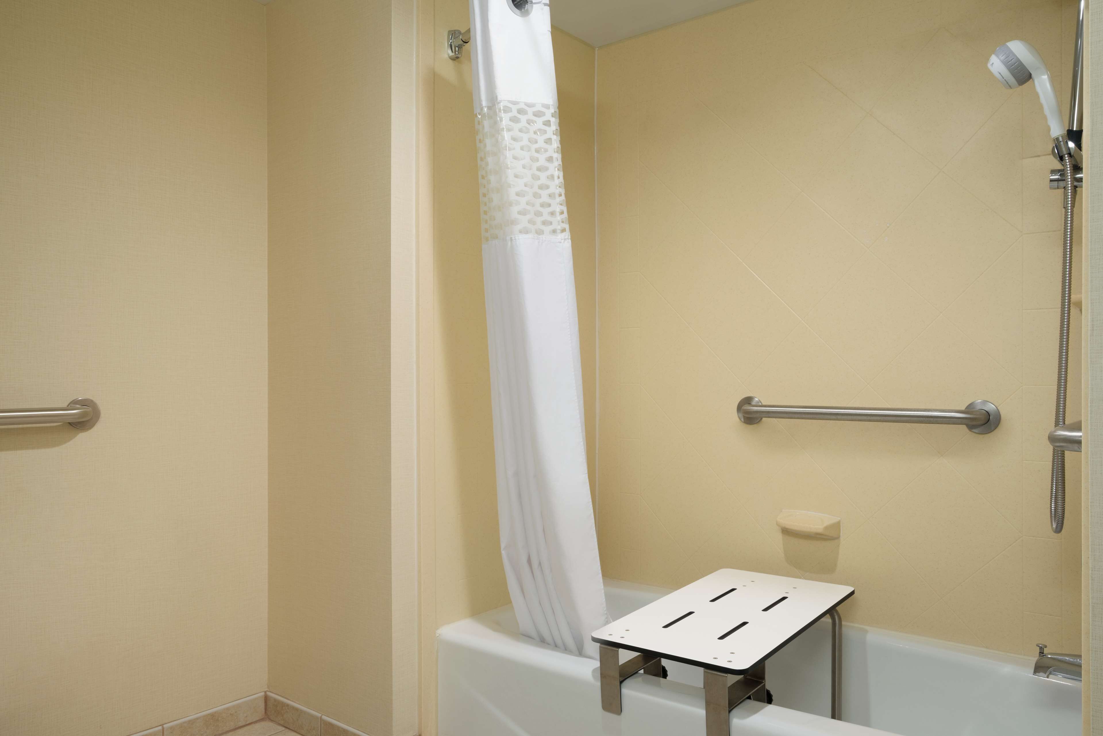 combined shower/bathtub, free toiletries, hair dryer, towels