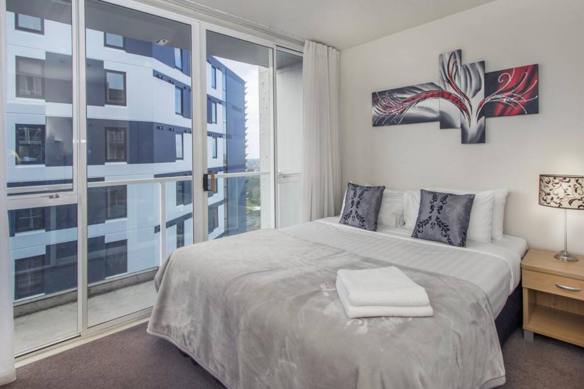 Standaard appartement, 2 slaapkamers | Verduisterende gordijnen, een strijkplank/strijkijzer