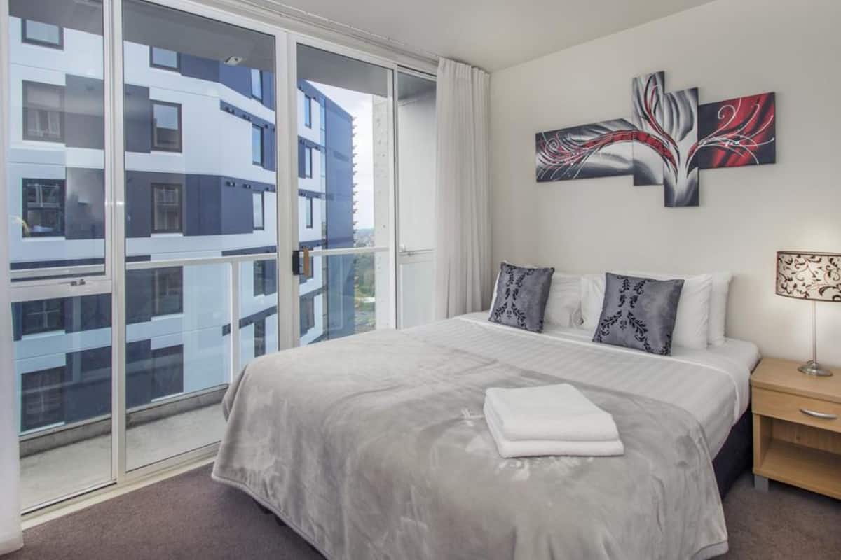 Two Bedroom Apartment (1 King, 1 Queen) | Blackout curtains, iron/ironing board, cots/infant beds, WiFi