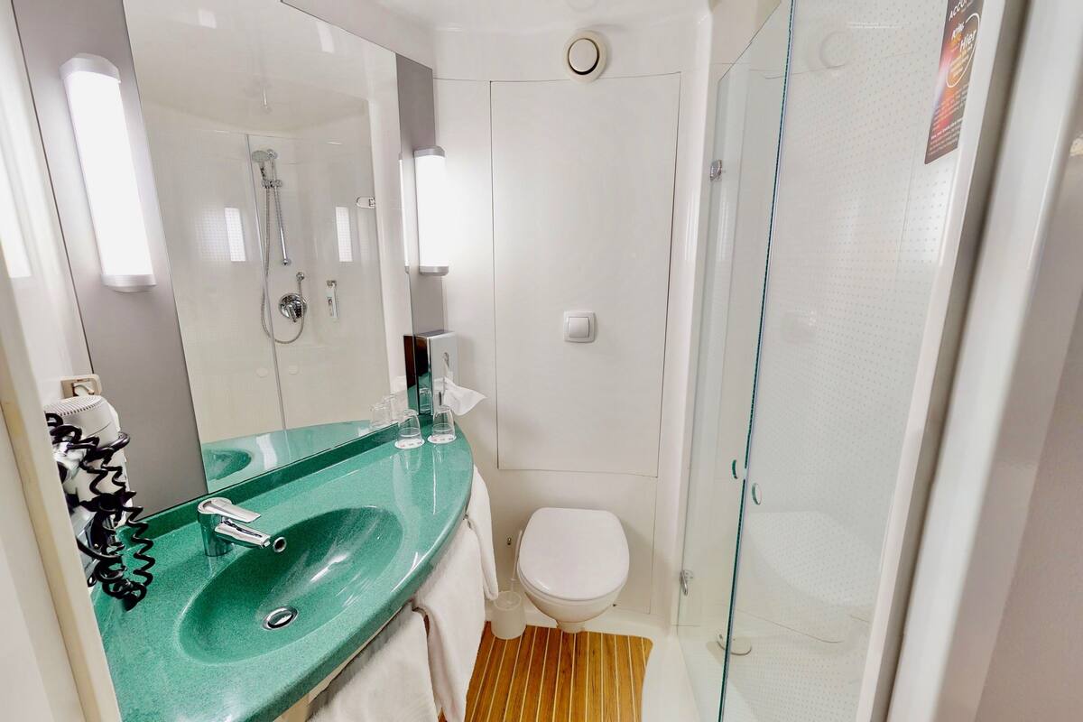 shower, eco-friendly toiletries, hair dryer, towels