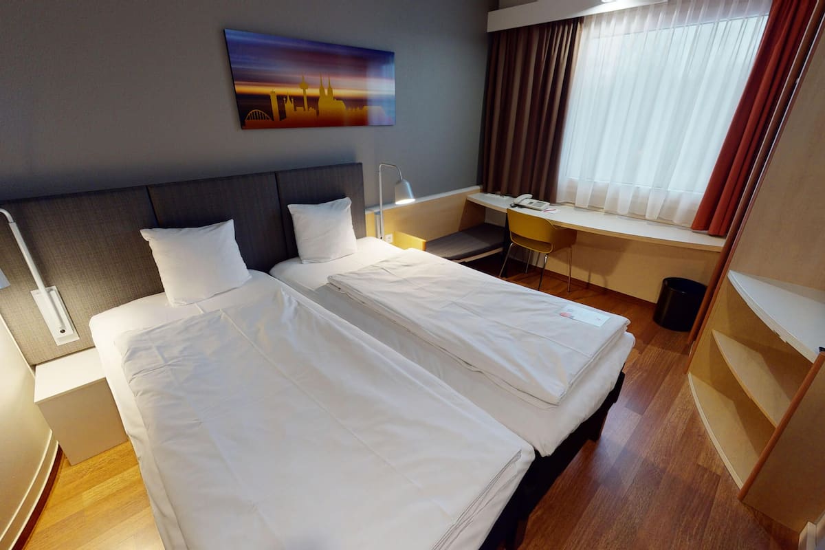 twin room, 2 single beds (new sleep easy concept) | desk, iron/ironing board, free wifi, bed sheets