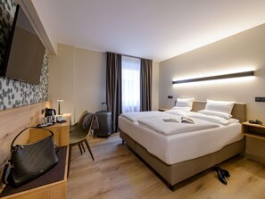 Kahden hengen standard-huone, 1 parisänky | Pillowtop-patjalliset sängyt, minibaari (osa tuotteista ilmaisia)