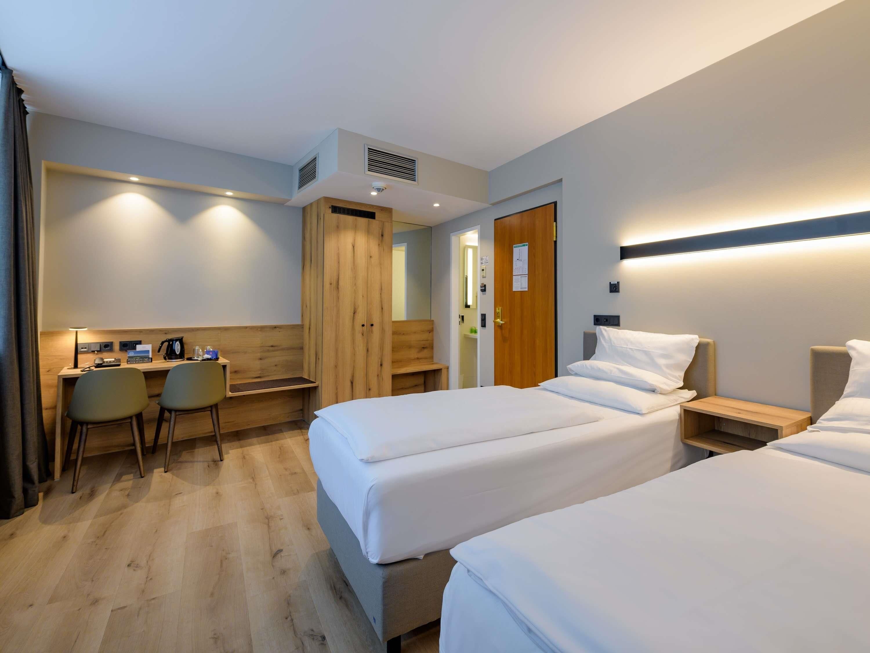 Pillow-top beds, free minibar items, in-room safe, desk