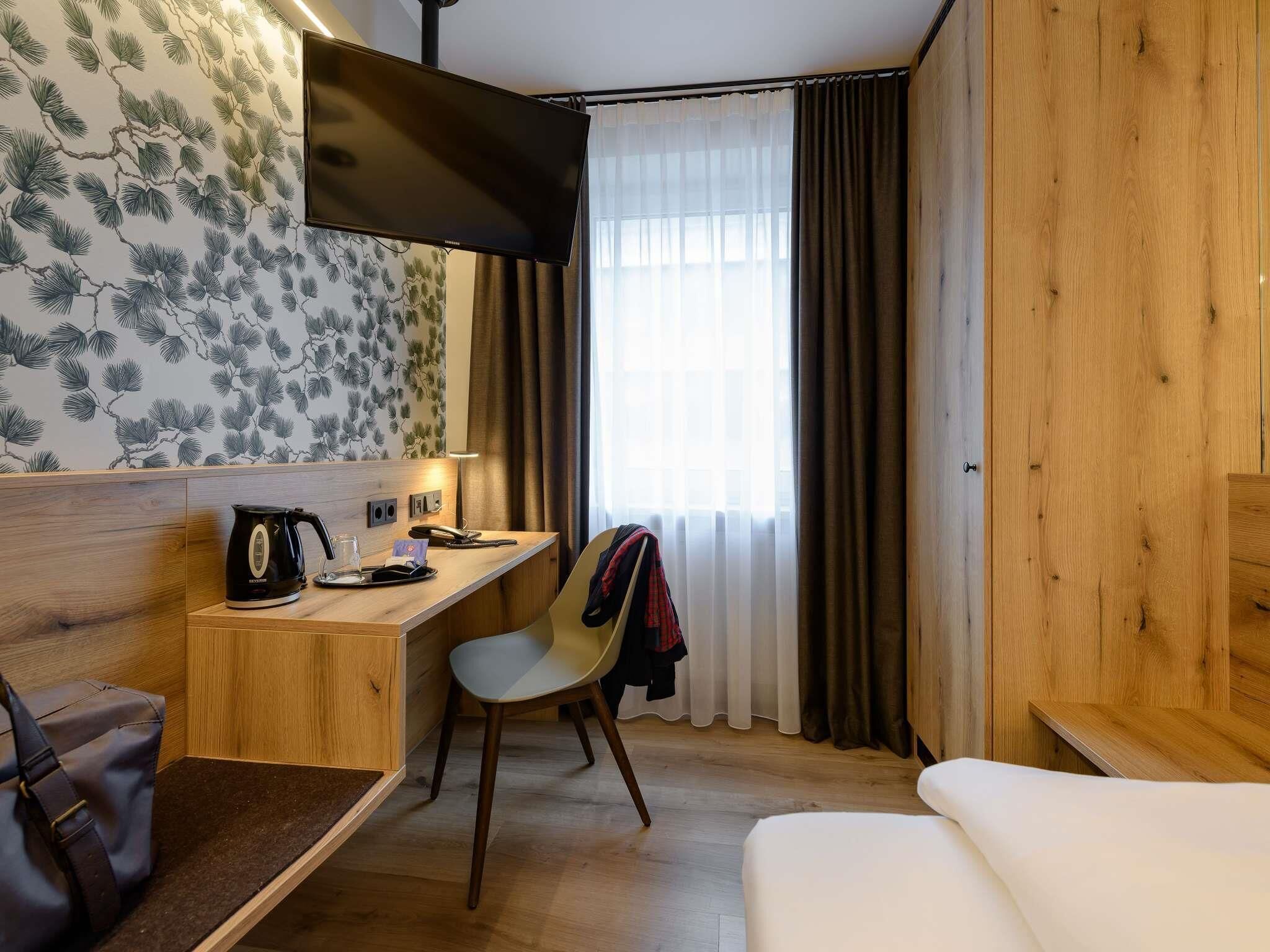 Pillowtop beds, free minibar items, in-room safe, desk