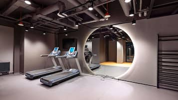 Indoor pool, open 7:00 AM to 10:00 PM, pool loungers, lifeguards on site