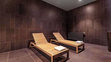 Indoor pool, open 7:00 AM to 10:00 PM, pool loungers, lifeguards on site