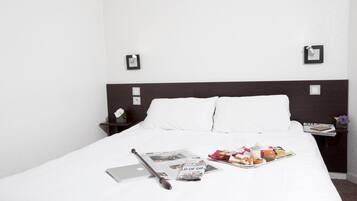 Hypo-allergenic bedding, desk, blackout drapes, soundproofing