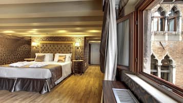 Junior Suite | 1 bedroom, premium bedding, minibar, in-room safe