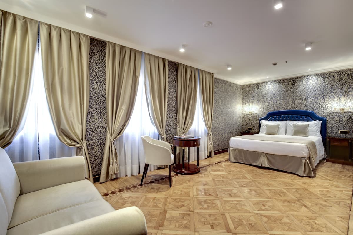 Junior Suite | 1 bedroom, premium bedding, minibar, in-room safe