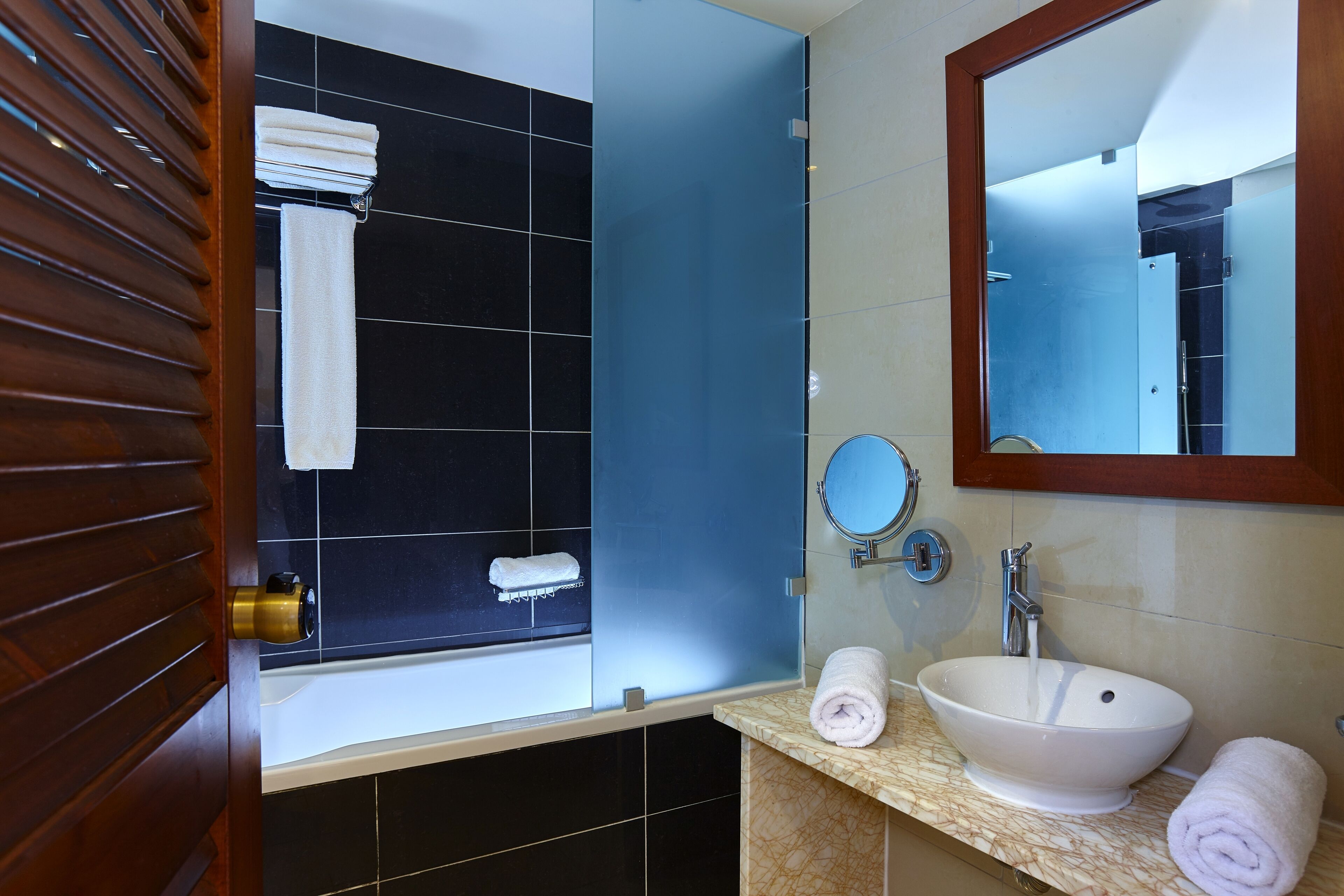 superior double room | bathroom | designer toiletries, hair dryer, towels