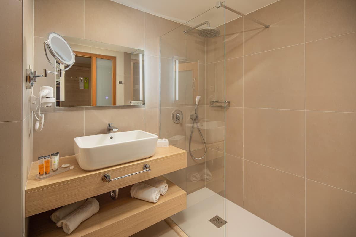 free toiletries, hair dryer, bathrobes, towels