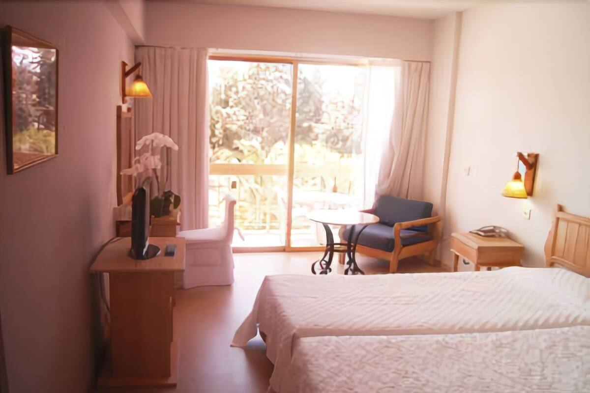 Standard Single Room | In-room safe, blackout drapes, iron/ironing board (on request)