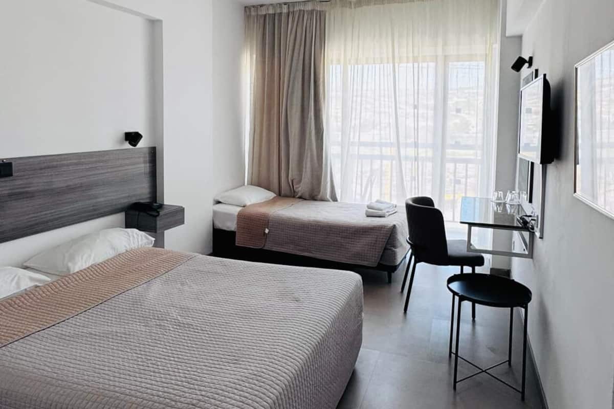 Desk, free cots/infant beds, free WiFi, bed sheets