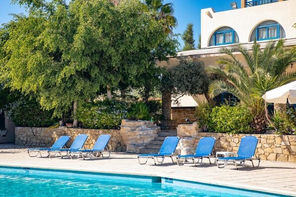 2 outdoor pools, open 9:00 AM to 6:00 PM, pool umbrellas, pool loungers