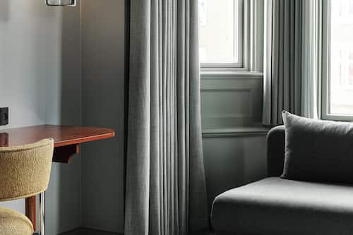 Hypo-allergenic bedding, in-room safe, desk, blackout drapes