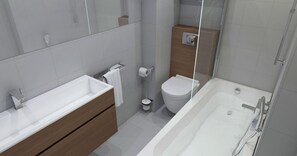 Un baño moderno con bañera, inodoro y lavamanos.