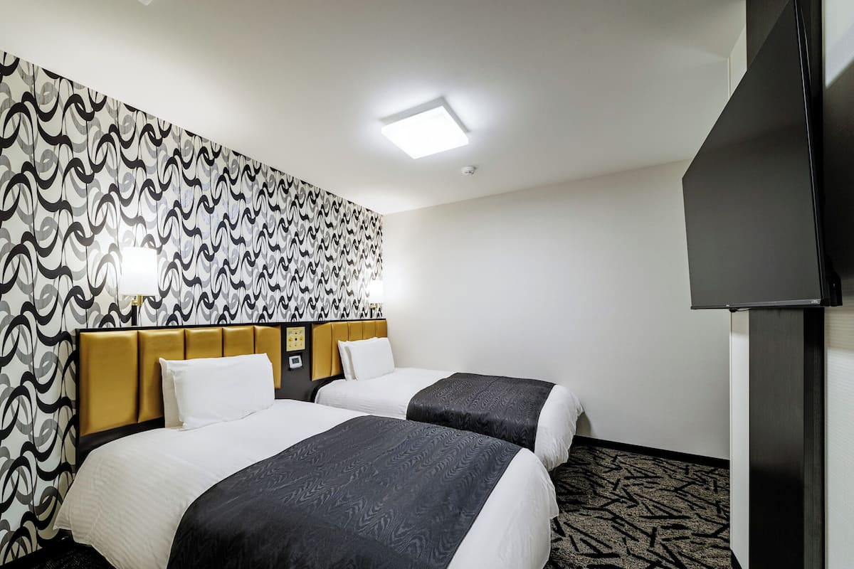 Twin Room, Non Smoking | Premium bedding, down comforters, desk, blackout drapes