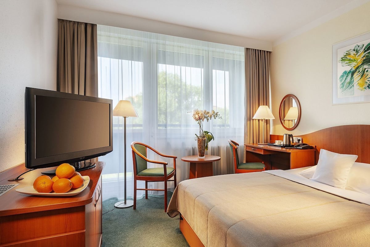 In-room safe, desk, laptop workspace, blackout curtains